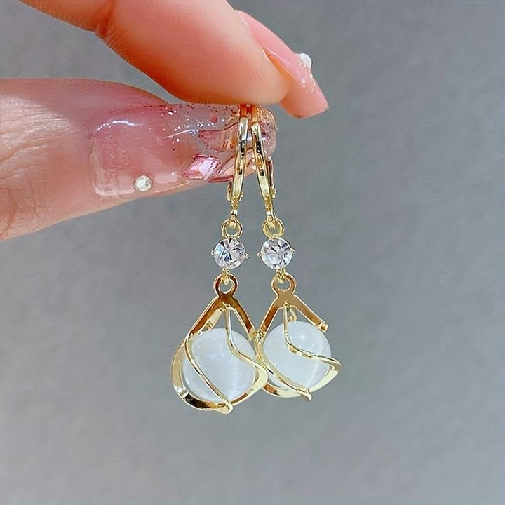 Eva - Dangling White Opal Gold Earrings